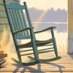 Quiet rocker on lakefront porch for exhausted days.